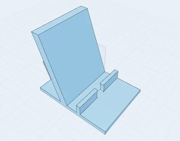 Phone stand with an angled backrest, a front lip and a slot for the charging cable