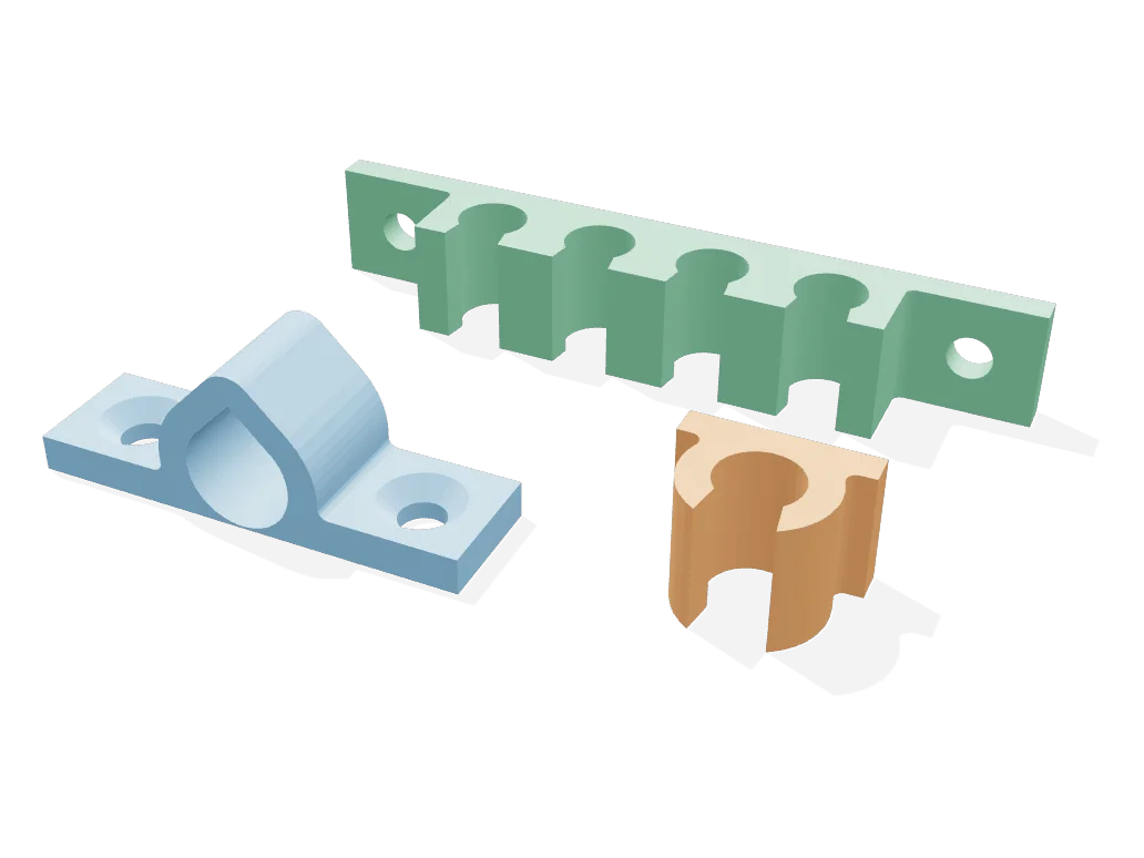 Cable saddle clamp, four-channel desk comb and snap clip